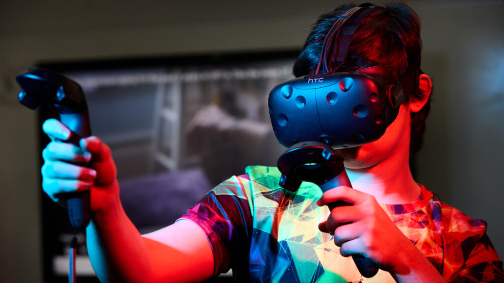 young person wearing VR headset