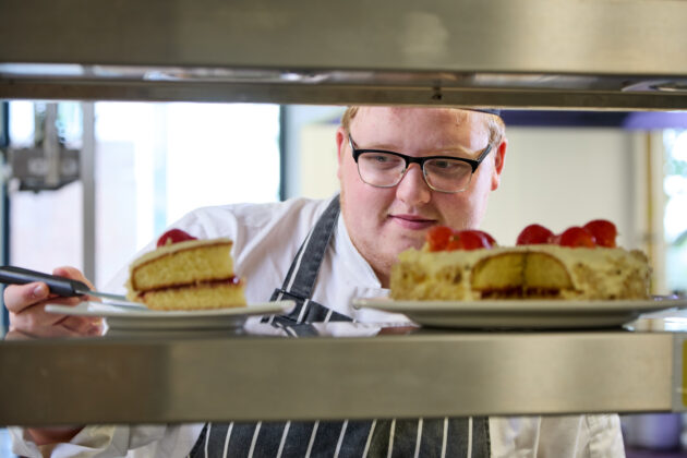 catering student serving cake