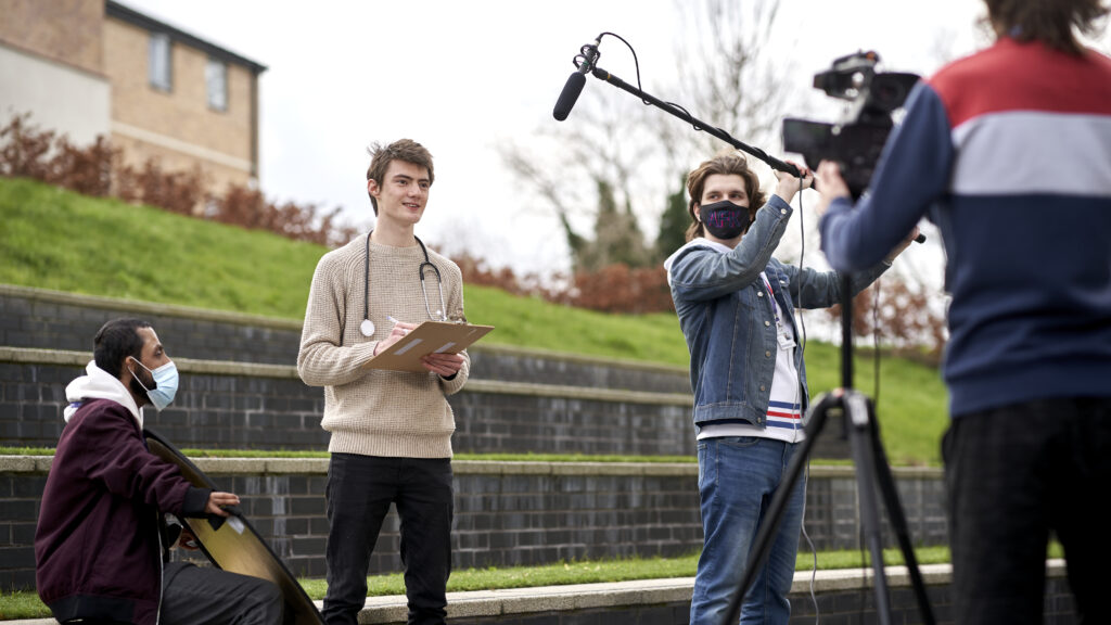 media students with camera and microphone